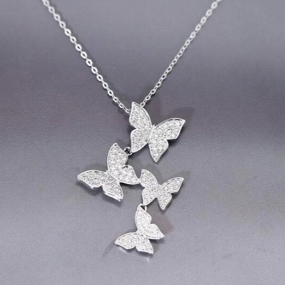 925 Plata Esterlina Blanco Oro Revestido Micron Pave 4 Mariposas Colgante de Encanto Para Mujeres